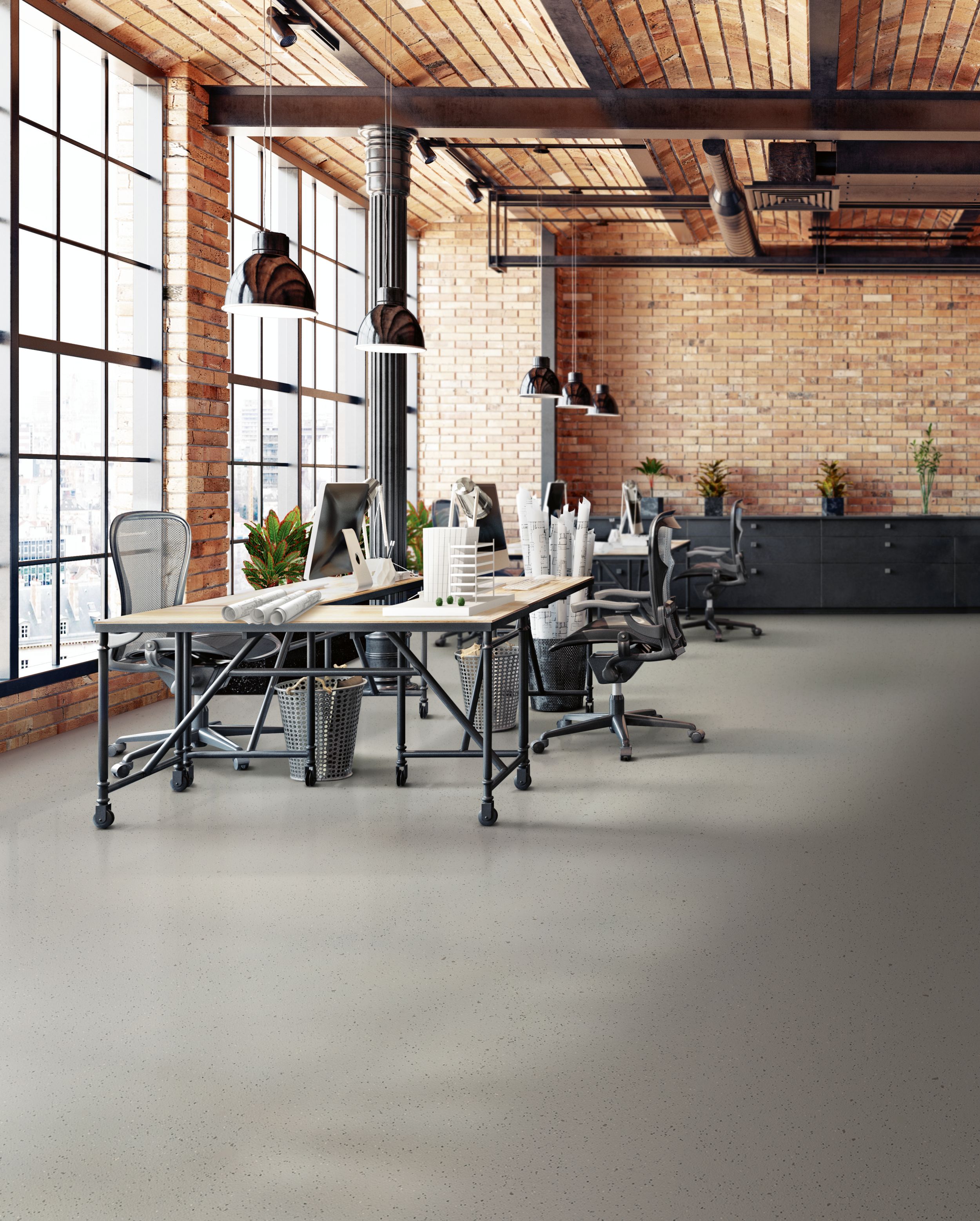 norament 926 kivo rubber flooring in open office workspace with exposed brick image number 2